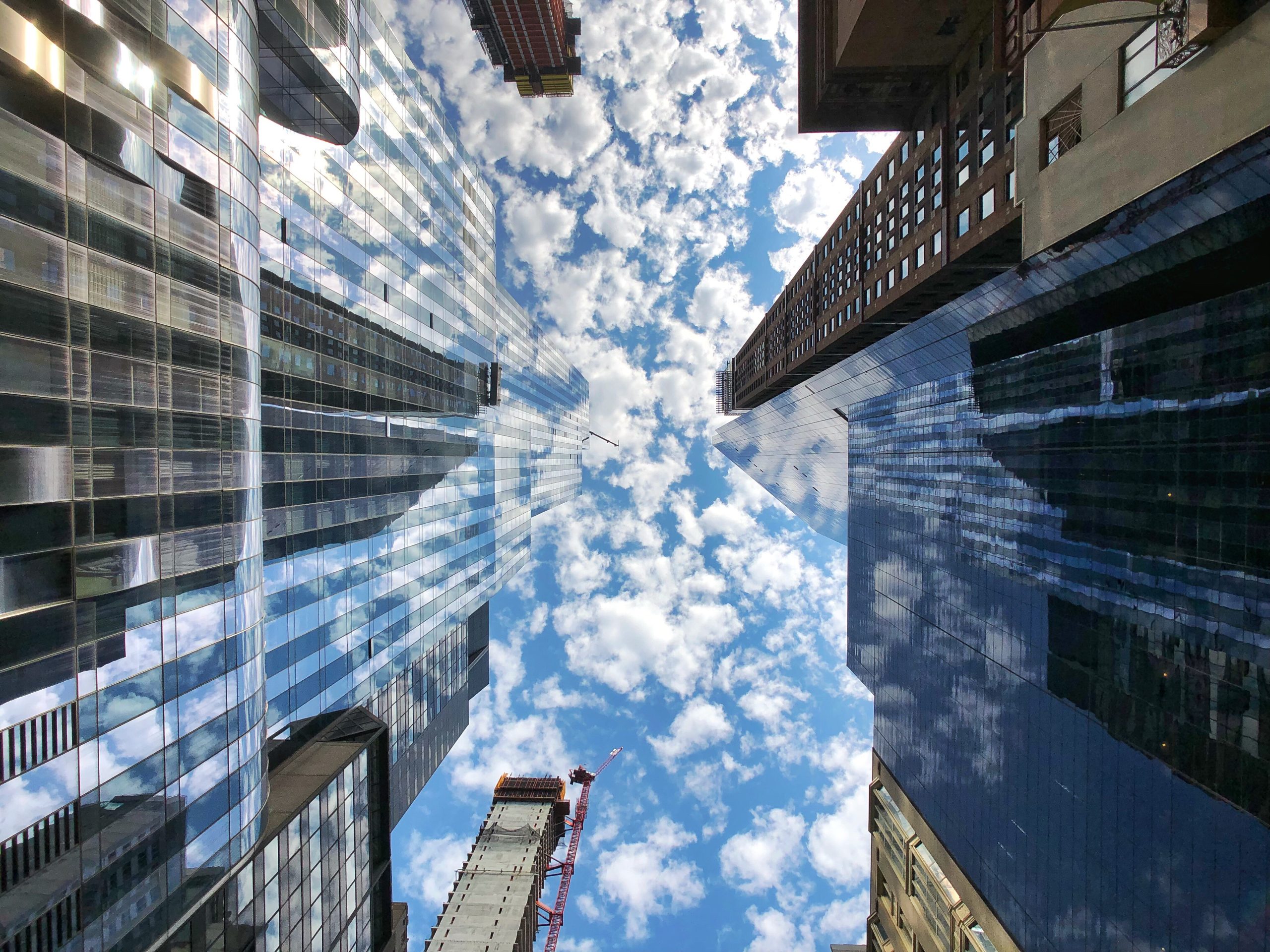directly-shot-modern-buildings-against-sky